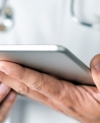 Doctor Using Tablet Computer Technology Telemedicine Telehealth